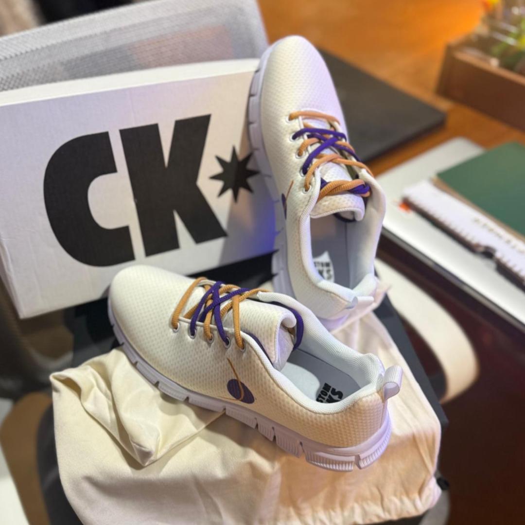 Custom company sneakers designed by Custom Kiks for an employee gifting program.