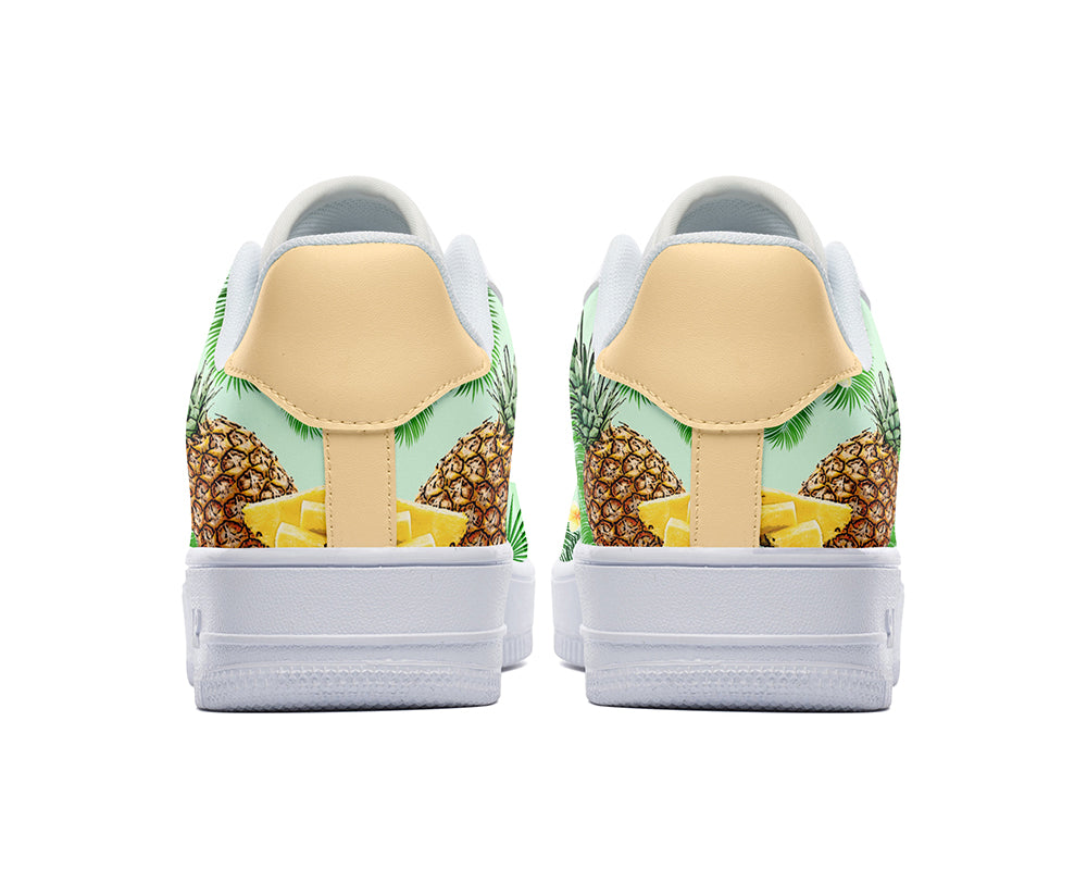 Custom Kiks Sneakers with tropical pattern featuring pineapples and palm leaves on a beige background