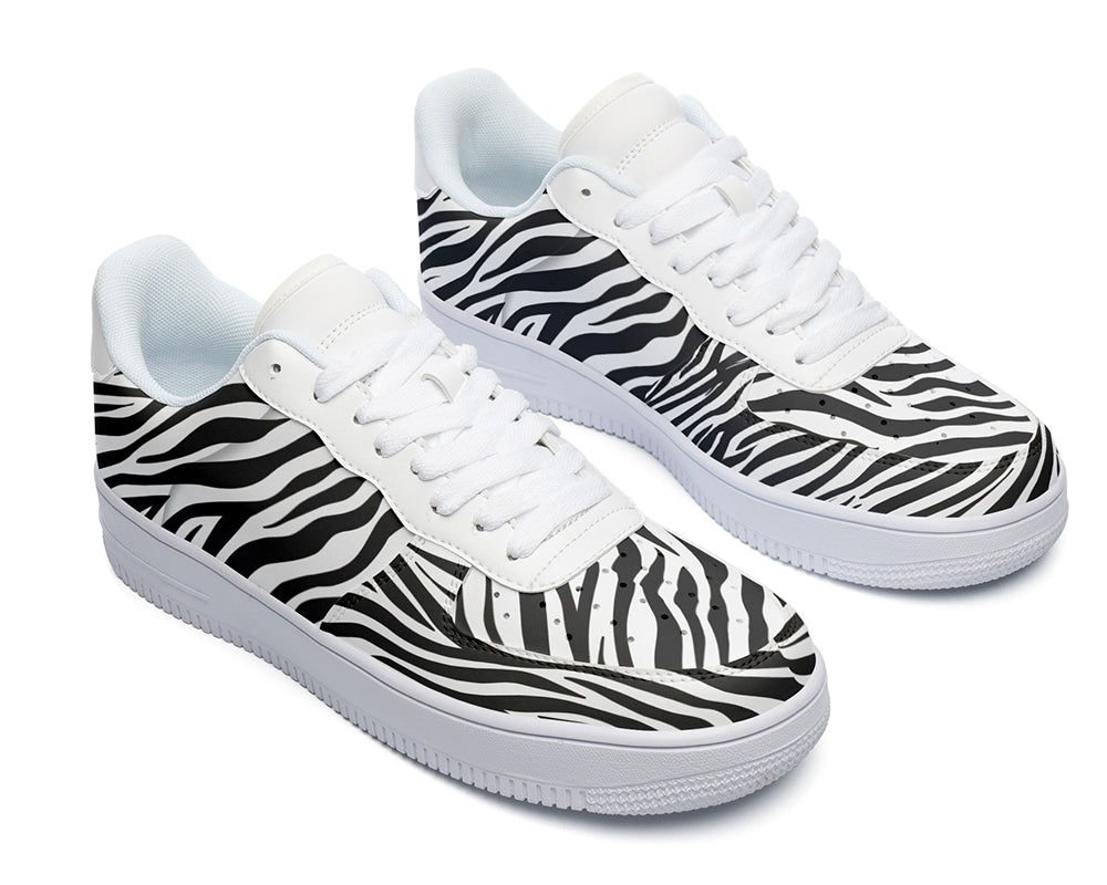 Court sneakers featuring classic black and white zebra print pattern artwork inspired by African wildlife.