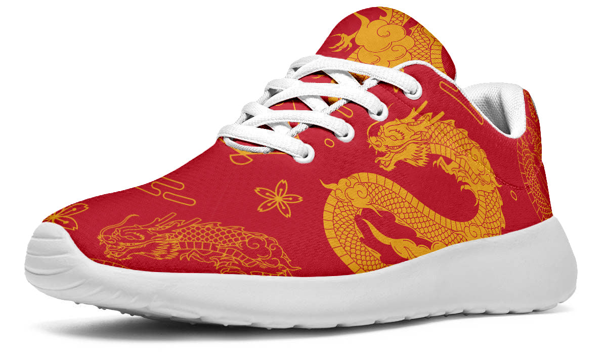 Red sport shoes featuring traditional golden Chinese dragon artwork with decorative cloud and floral pattern details.