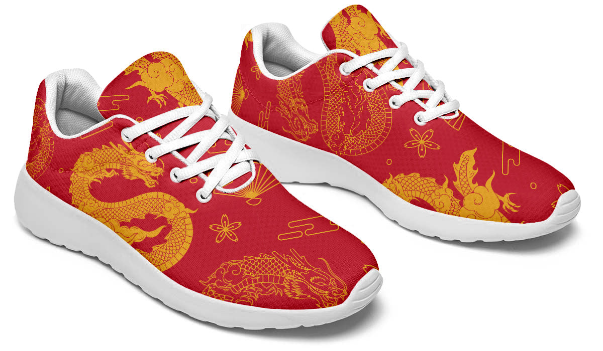 Red sport shoes featuring traditional golden Chinese dragon artwork with decorative cloud and floral pattern details.