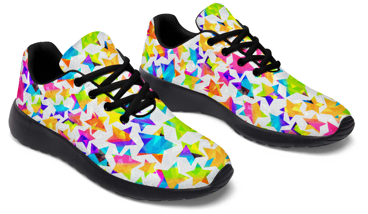 Sport shoes featuring colorful multicolor star patterns on a white background with bright geometric artwork.