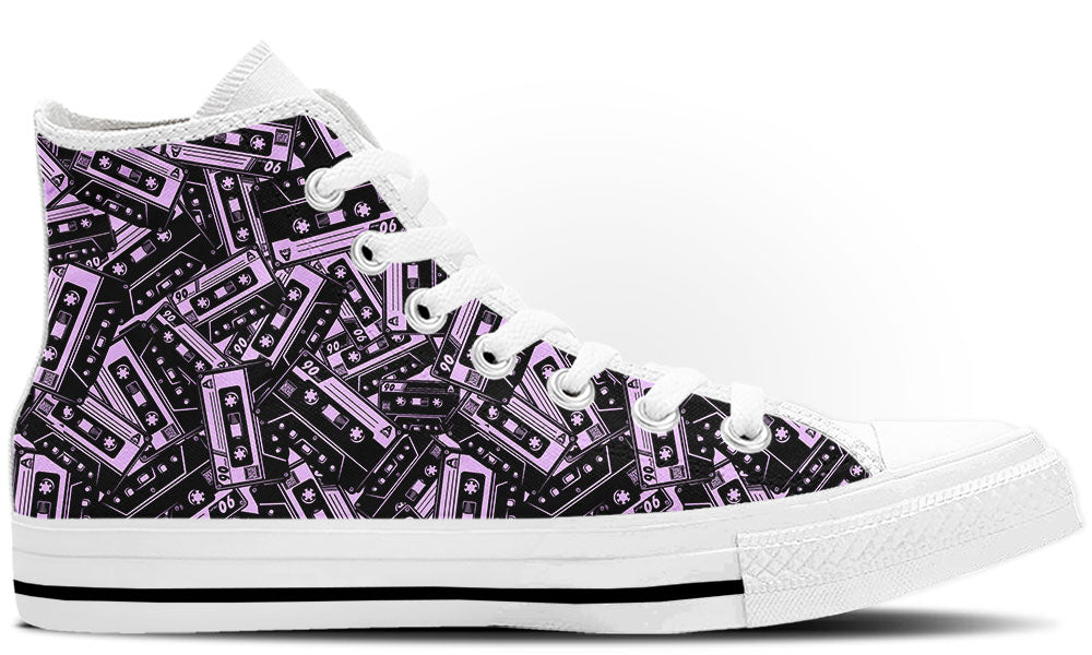 High Top sneaker in white sole with a side view featuring a repeating seamless pattern of purple and black retro cassette tapes.