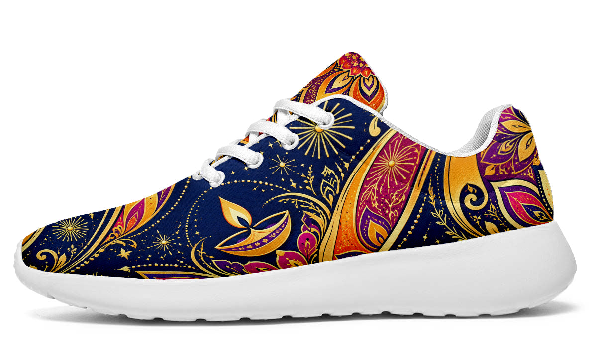 Diwali Sport Shoes featuring golden diya lamps, starbursts, and vibrant paisley patterns in blue, magenta, and orange, with white laces and soles.