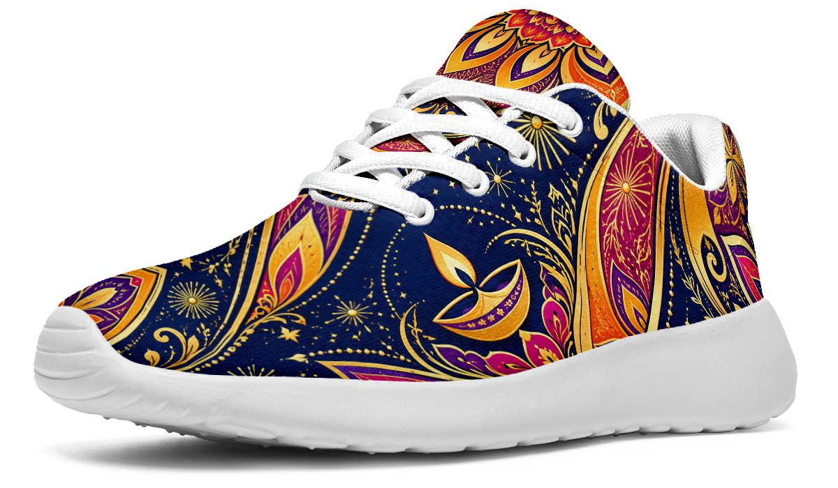 Diwali Sport Shoes featuring golden diya lamps, starbursts, and vibrant paisley patterns in blue, magenta, and orange, with white laces and soles.