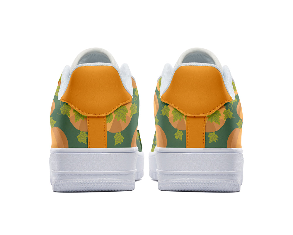 Jack-o-Lantern graphic court sneakers with green background and orange pumpkin patterns