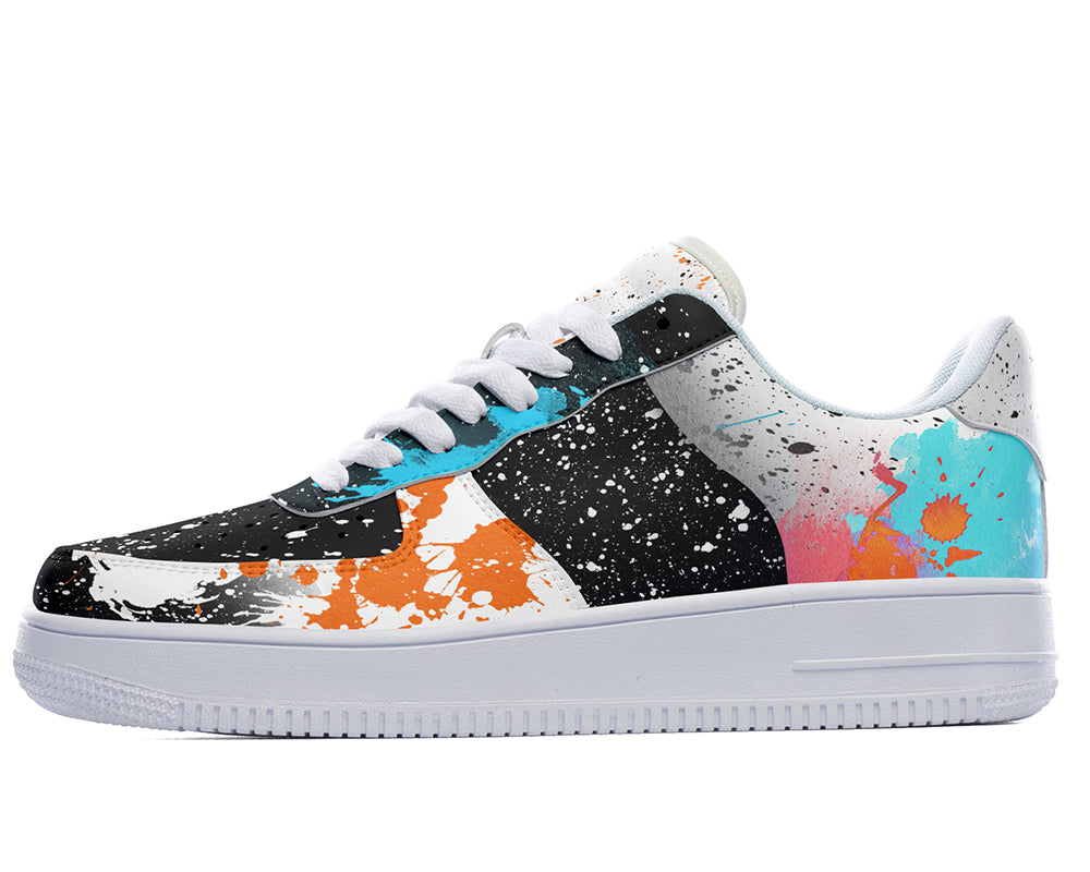 Court sneakers featuring an abstract paint splatter design with black, white, orange, and blue paint splash artwork.