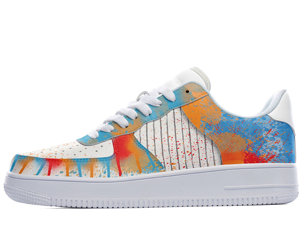 Court sneakers featuring colorful graffiti-inspired spray paint artwork with blue, orange, and red paint splatter details.