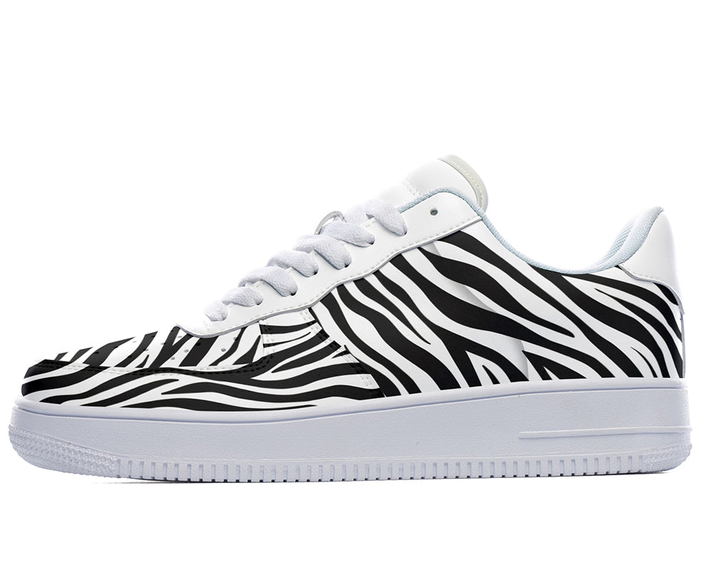 Court sneakers featuring classic black and white zebra print pattern artwork inspired by African wildlife.