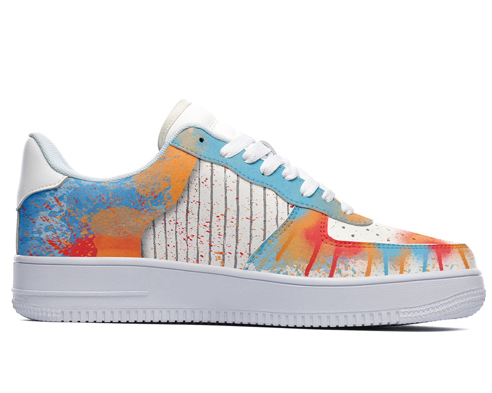 Court sneakers featuring colorful graffiti-inspired spray paint artwork with blue, orange, and red paint splatter details.