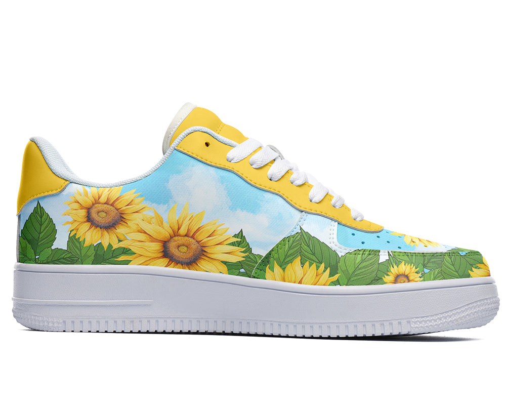 Custom Kiks Sunflower sneakers with a yellow upper and white sole. The upper is decorated with a pattern of sunflowers and blue sky.