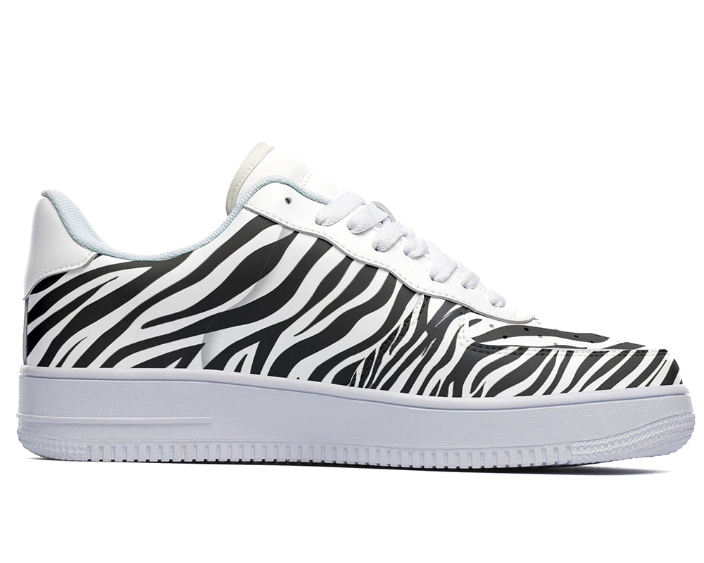 Court sneakers featuring classic black and white zebra print pattern artwork inspired by African wildlife.