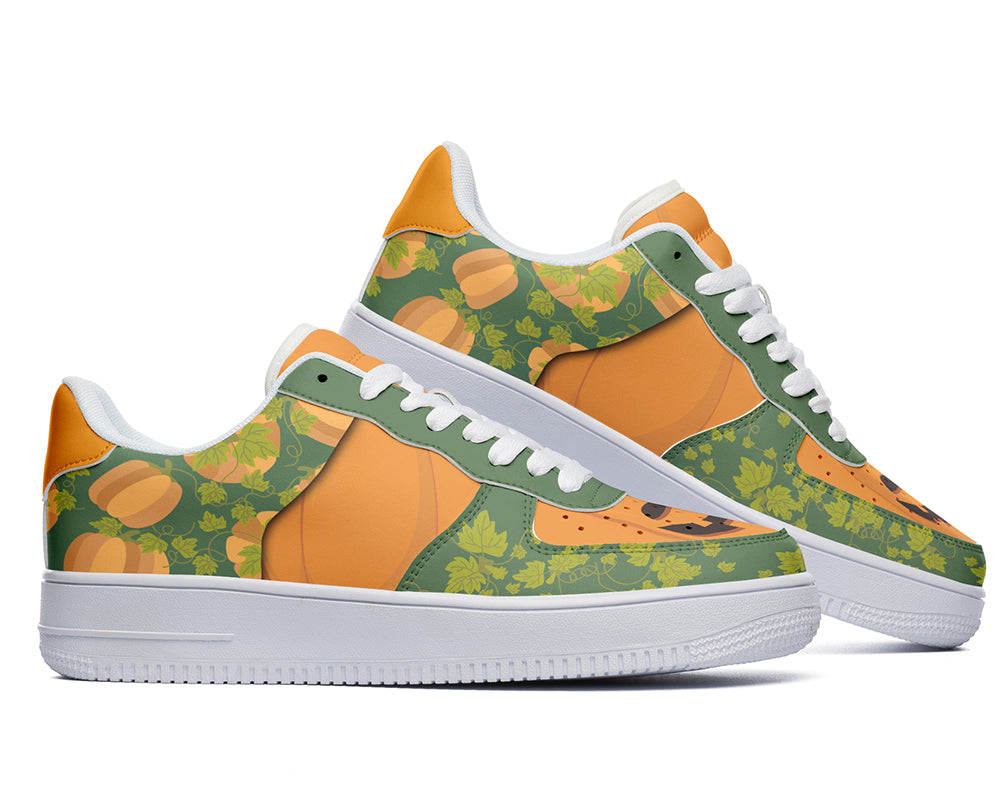 Jack-o-Lantern graphic court sneakers with green background and orange pumpkin patterns