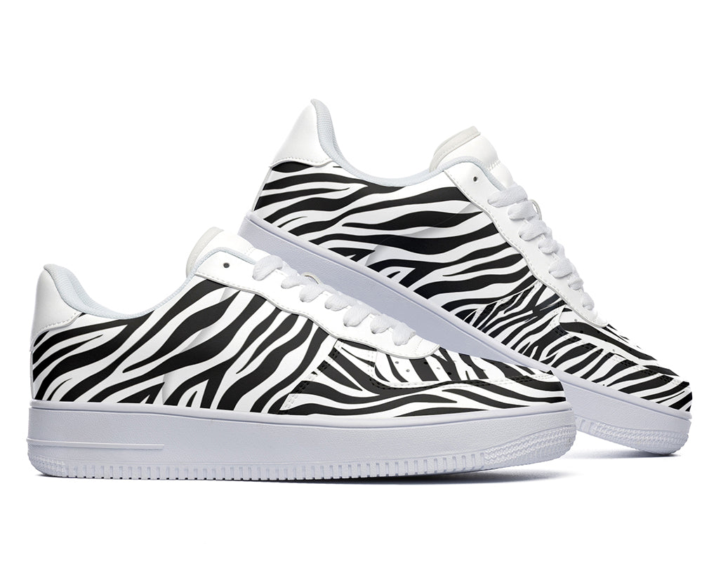 Court sneakers featuring classic black and white zebra print pattern artwork inspired by African wildlife.