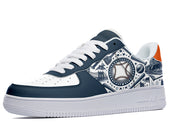 White sneakers with a navy blue design featuring a baseball, baseball bats, stars, and the Brooklyn Bridge. 
