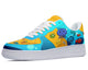 A colorful pair of shoes with a pattern of cartoon monsters, sea creatures, and hearts on a blue background.