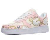 A white sneaker with a pink floral pattern. The pattern features clocks and gears.