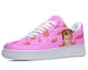 A pink sneaker with a white sole, white laces, and a design of red lightning bolts and a musician's face on the side.