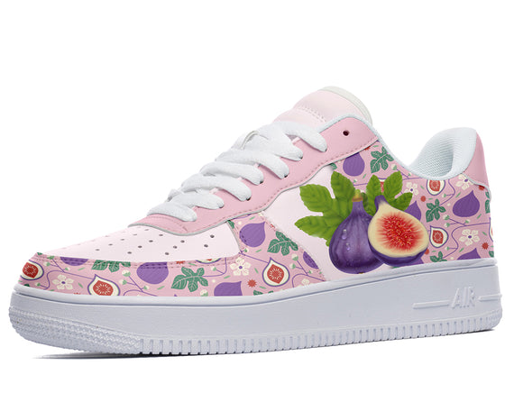 A pink sneaker with a white sole and laces. The sneaker has a design of purple figs, green leaves, and pink flowers on the sides.