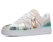 White sneakers with a watercolor design of a fox standing in a snowy forest.