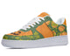 A green and orange sneaker with a pumpkin and vine design.