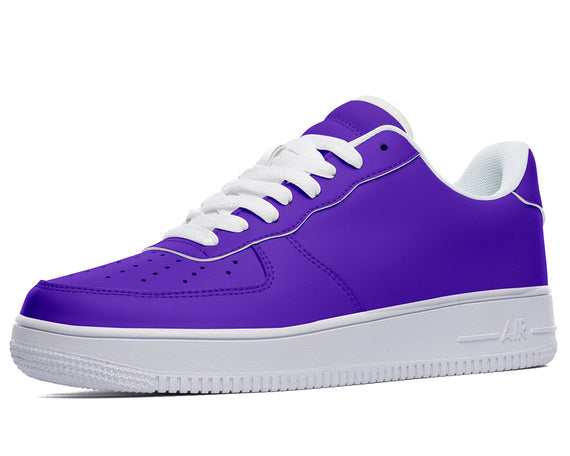 Purple sneakers with white laces and a white sole.
