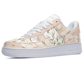 A close-up of a sneaker with a floral pattern on the upper. The sneaker has a white midsole and outsole.