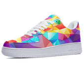 A low-top sneaker with a white sole and a geometric pattern in bright colors on the upper.