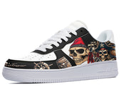 White sneakers with a black and red design featuring two pirate skulls, barrels, and a ship's wheel. 
