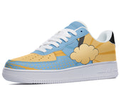 A blue and yellow sneaker with a pop art design featuring a speech bubble and rays. 