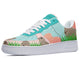 A close-up of a sneaker with a custom design. The sneaker is white with a blue swoosh and a light blue, pink, and green upper. The upper features a repeating pattern of cartoon wombats in various poses.