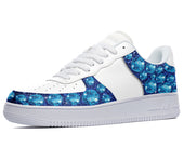 White sneakers with a blue diamond design on the side and toe. 
