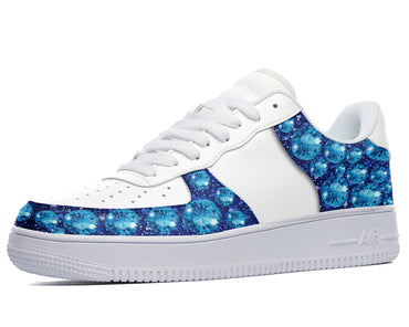 White sneakers with a blue diamond design on the side and toe. 