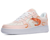 A pink sneaker with a white sole and white laces. The sneaker has a design of cooked shrimp on the side.