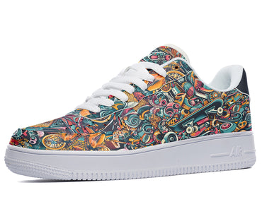 White sneakers with a colorful doodle design featuring skateboards, wheels, and other objects. 