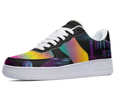 A black sneaker with a colorful geometric pattern on the upper and a white sole.