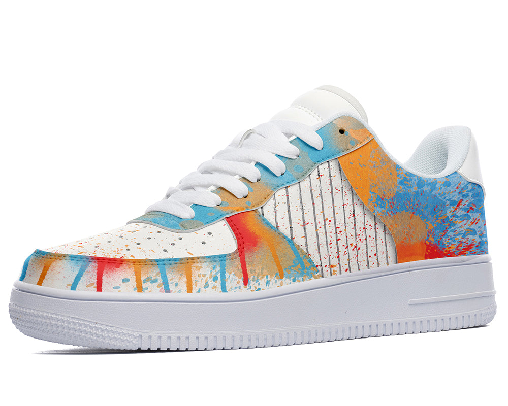 Court sneakers featuring colorful graffiti-inspired spray paint artwork with blue, orange, and red paint splatter details.