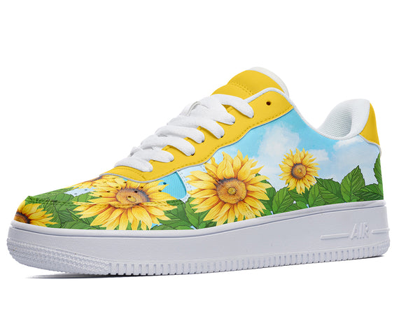 Custom Kiks Sunflower sneakers with a yellow upper and white sole. The upper is decorated with a pattern of sunflowers and blue sky.