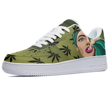 A sneaker with an image of a woman wearing a headscarf and smoking a marijuana cigarette. The sneaker is mostly green with white accents and a white sole.