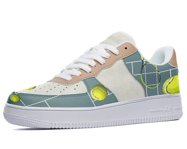 White sneakers with a blue tennis court design featuring tennis balls and rackets. 