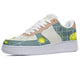 White sneakers with a blue tennis court design featuring tennis balls and rackets. 
