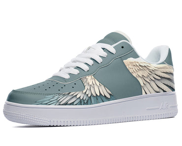 A pair of blue sneakers with a white feather wing design. 