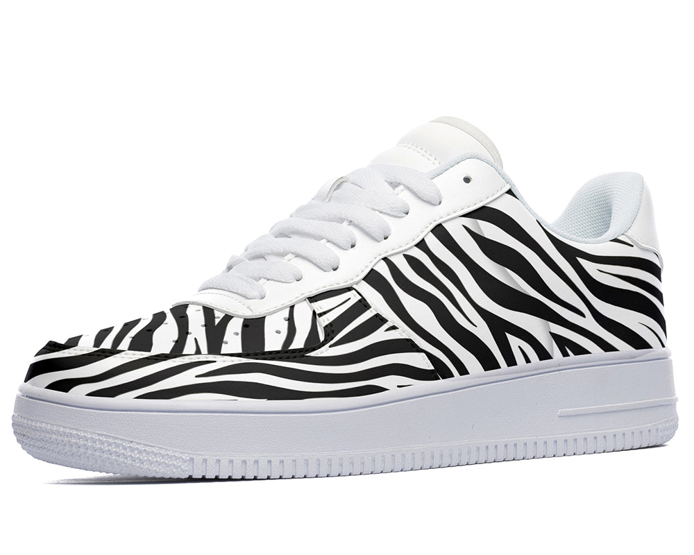Court sneakers featuring classic black and white zebra print pattern artwork inspired by African wildlife.