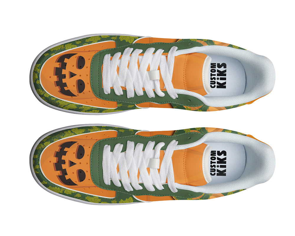Jack-o-Lantern graphic court sneakers with green background and orange pumpkin patterns