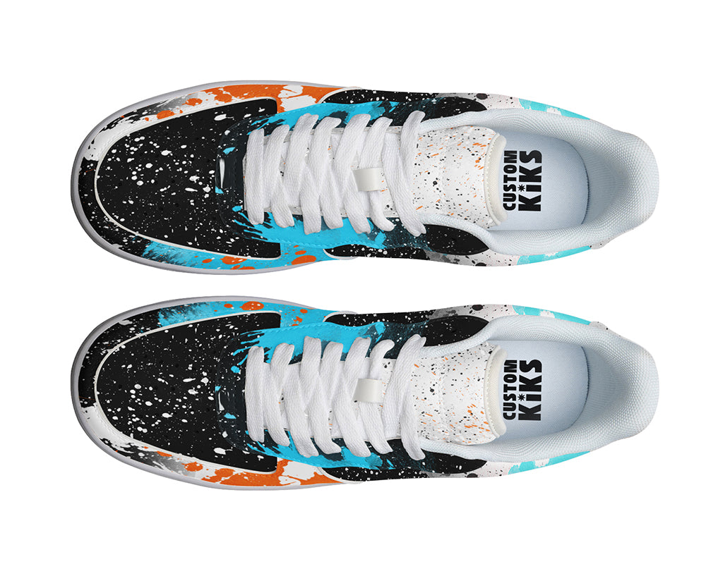 Court sneakers featuring an abstract paint splatter design with black, white, orange, and blue paint splash artwork.