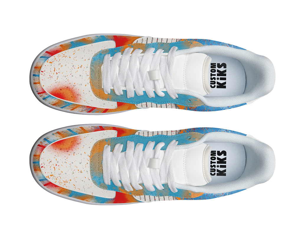 Court sneakers featuring colorful graffiti-inspired spray paint artwork with blue, orange, and red paint splatter details.