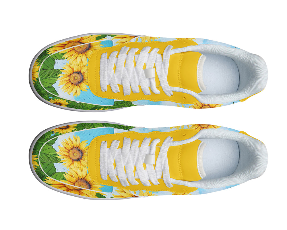 Custom Kiks Sunflower sneakers with a yellow upper and white sole. The upper is decorated with a pattern of sunflowers and blue sky.