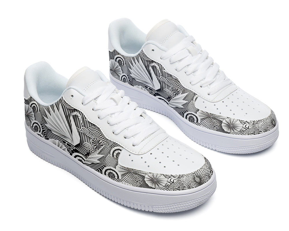 White court sneakers featuring black and white origami-inspired artwork with geometric paper-folding patterns and abstract monochrome design details.