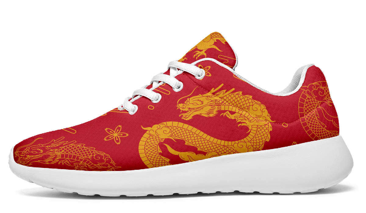 Red sport shoes featuring traditional golden Chinese dragon artwork with decorative cloud and floral pattern details.