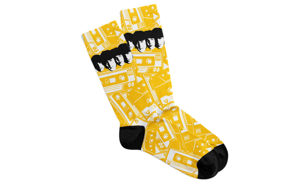 Custom Kiks unisex socks with Beatles-inspired yellow background design

